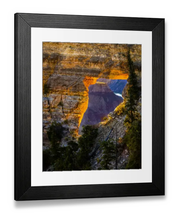 Framed Print : USA, Arizona, Grand Canyon National Park. View through hole in canyon wall at sunrise