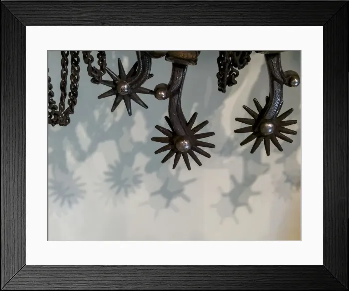 Framed Print : USA, Arizona, Scottsdale. Cowboy spurs and shadows. Credit as