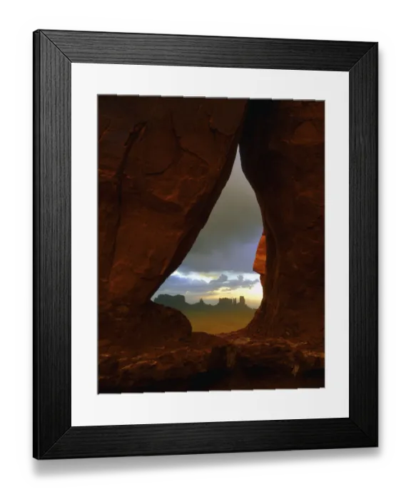 Framed Print : Teardrop arch frames the Monument Valley rock formations on the Utah, Arizona border Framed Print : Teardrop arch frames the Monument Valley rock formations on the Utah, Arizona border