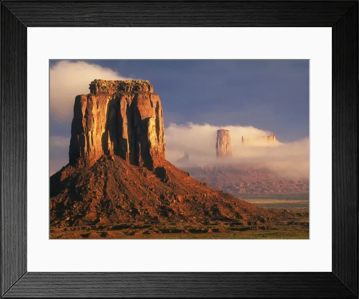 Framed Print : Clouds dance in the buttes in Monument Valley, on the Arizona, Utah border Framed Print : Clouds dance in the buttes in Monument Valley, on the Arizona, Utah border