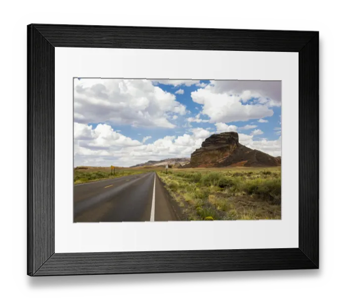 Framed Print : Navajo Nation, Arizona. Back road past a butte Framed Print : Navajo Nation, Arizona. Back road past a butte