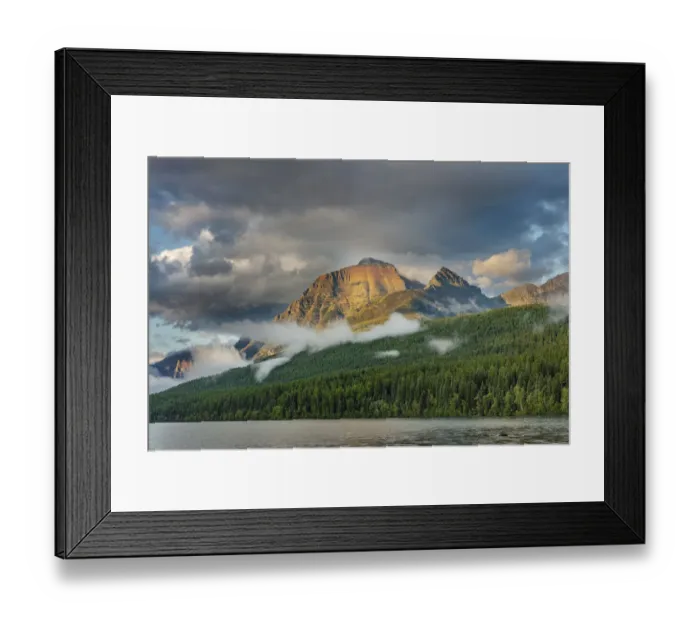 Framed Print : Stormy late afternoon light on Rainbow Peak at Bowman Lake in Glacier National Park