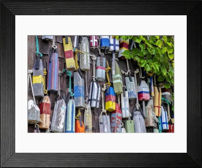 Framed Print : Wooden buoys