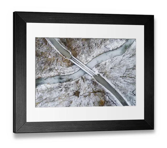 Framed Print : Aerial view of winter forest, bridge, and creek Stephen A Framed Print : Aerial view of winter forest, bridge, and creek Stephen A