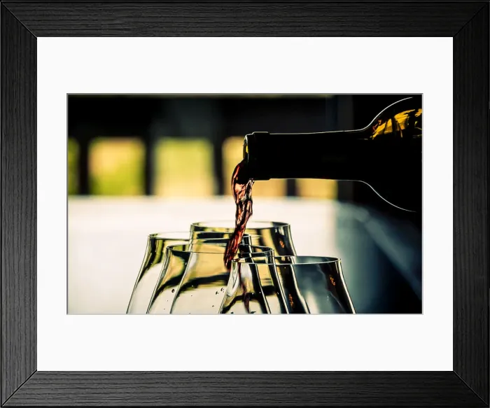 Framed Print : USA, Oregon, Willamette Valley Dramatic pour of pinot noir in an Oregon winery