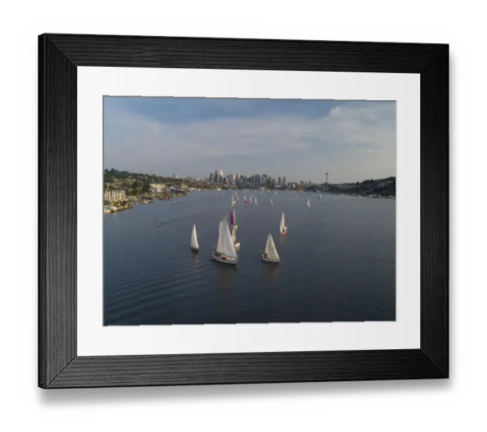 Framed Print : Aerial view of sailboats racing on Lake Union in the evening with the Seattle skyline in Framed Print : Aerial view of sailboats racing on Lake Union in the evening with the Seattle skyline in