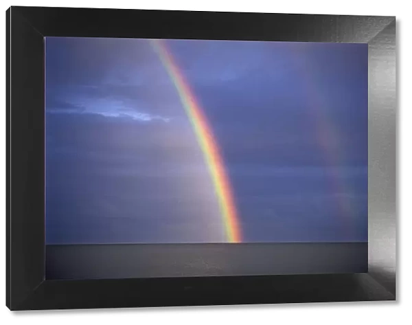 Canada, Manitoba, Winnipeg. Rainbow on Lake Winnipeg after storm