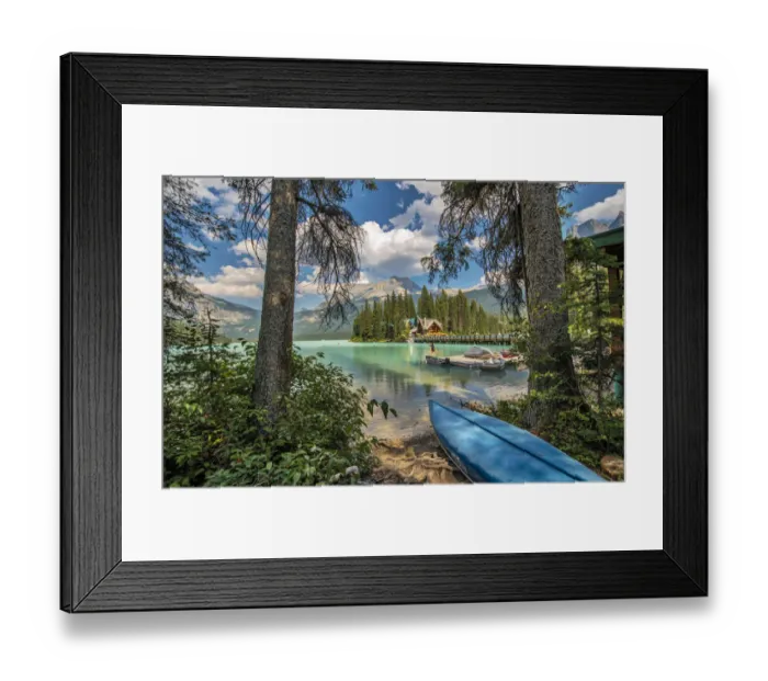 Framed Print : Blue canoe on shore of Emerald lake in Yoho National Park, Canada Framed Print : Blue canoe on shore of Emerald lake in Yoho National Park, Canada