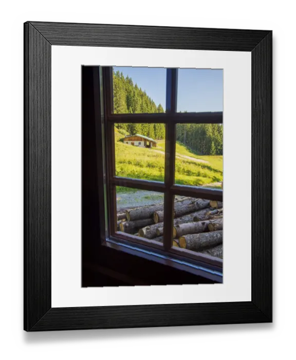 Framed Print : View out a window toward a cabin nestled in the hills of the Austrian Alps Framed Print : View out a window toward a cabin nestled in the hills of the Austrian Alps