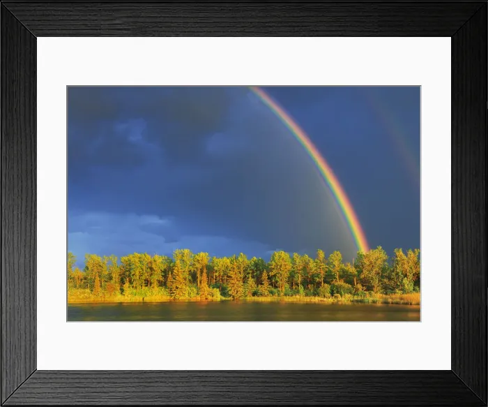 Framed Print : Canada, Yukon, Saskatchewan. Rainbow over forest and lake. Canada