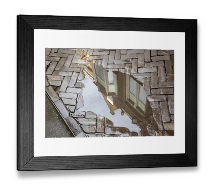 Framed Print : Europe, Netherlands, The Hague. Buildings reflected in sidewalk rain puddle Framed Print : Europe, Netherlands, The Hague. Buildings reflected in sidewalk rain puddle