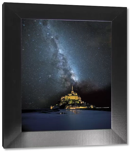 Europe, France. Milky Way over Le Mont St. Michel landmark