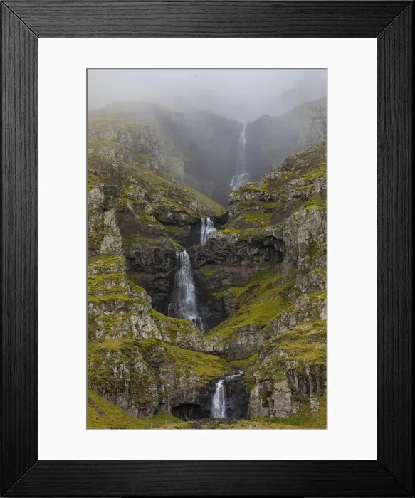 Framed Print : Europe, Iceland. Thin waterfall cascades down a mountainside in southern Iceland Framed Print : Europe, Iceland. Thin waterfall cascades down a mountainside in southern Iceland
