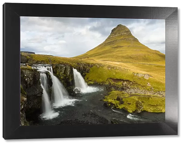 Europe, Iceland. Iconic view of Kirkjufell mountain with waterfall in foreground