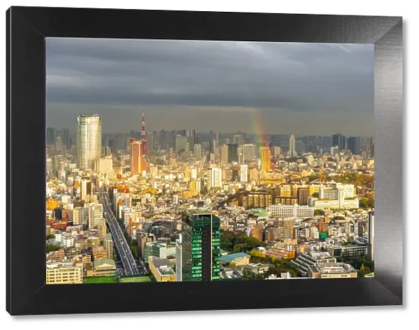 Cityscape of Tokyo at sunset with a rainbow as viewed from Shibuya Scramble Square in