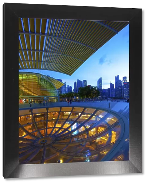 Singapore. Street-level overview of city at twilight