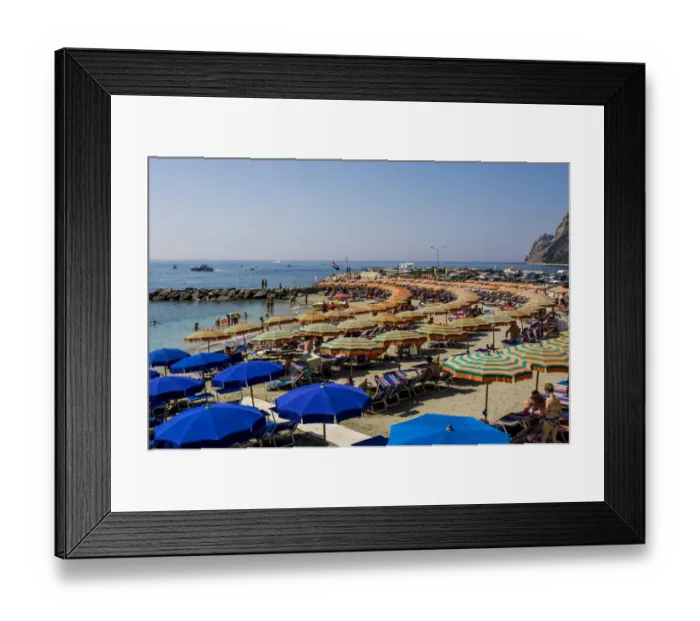 Framed Print : Beach umbrellas lining the beach in Monterosso al Mare, Cinque Terre, Italy