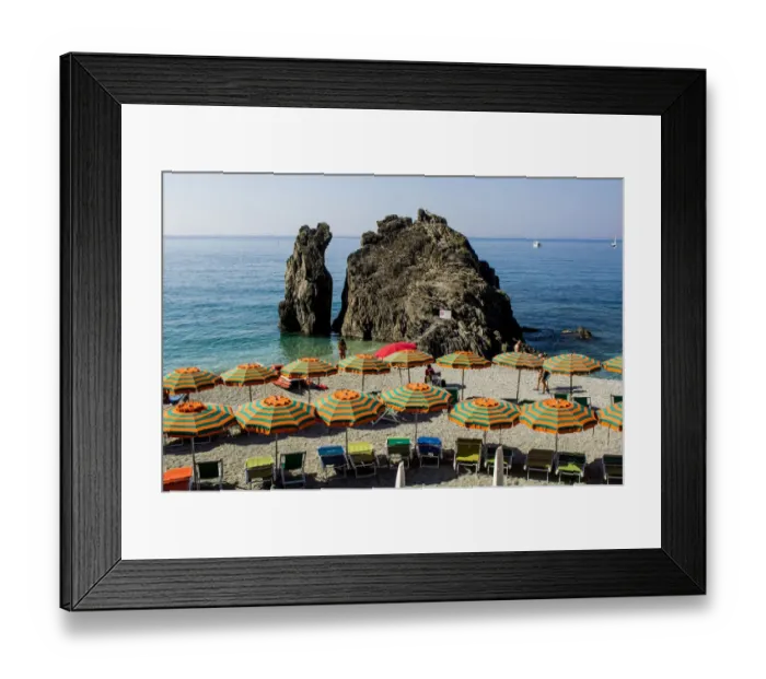 Framed Print : Beach umbrellas lining the beach in Monterosso al Mare, Cinque Terre, Italy Framed Print : Beach umbrellas lining the beach in Monterosso al Mare, Cinque Terre, Italy