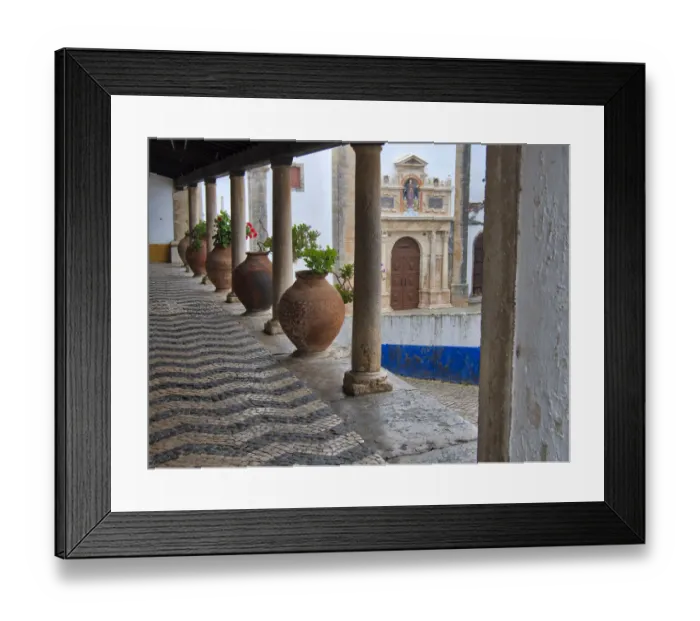 Framed Print : Portugal, Obidos. Ceramic pots adorning a building ledge