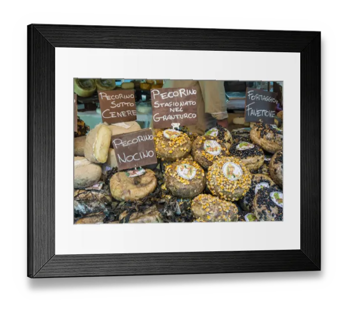 Framed Print : Cortona, Italy. Pecorino Sotto Vinaccia cheese rounds aged under straw
