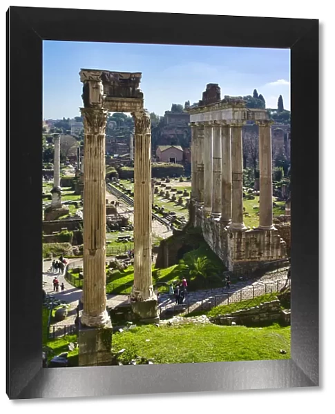 Italy, Rome, temple and arch ruins at Roman Forum