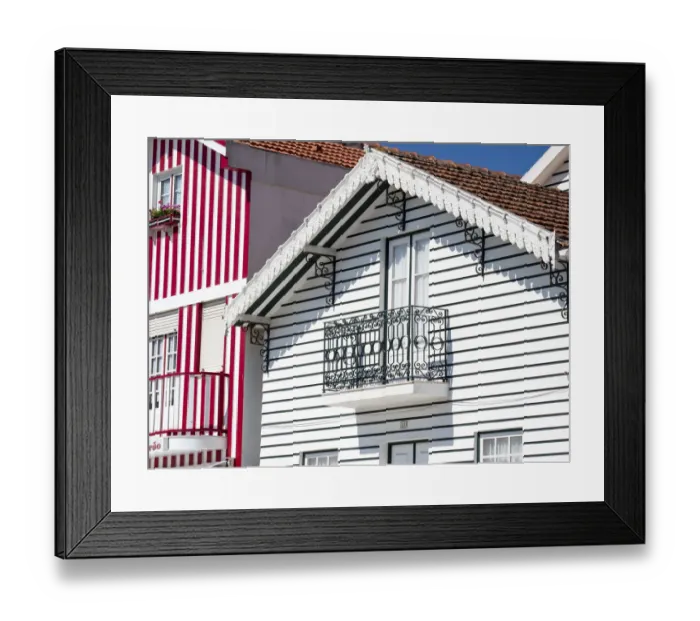 Framed Print : Portugal, Costa Nova. Colorful houses Palheiros striped homes