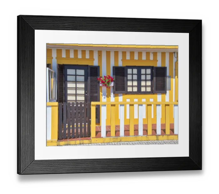 Framed Print : Portugal, Costa Nova. Colorful houses Palheiros striped homes