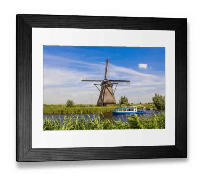 Framed Print : Canal tour boat and windmill in Unesco World Heritage Site, Kinderdijk, Holland Framed Print : Canal tour boat and windmill in Unesco World Heritage Site, Kinderdijk, Holland