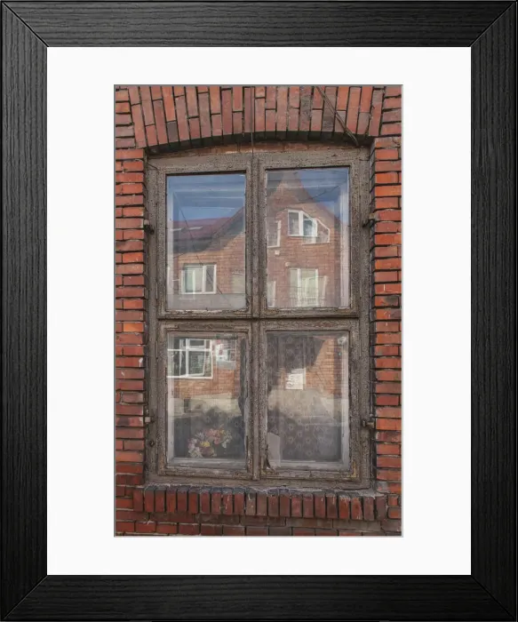 Framed Print : Window in a rowhouse in Wislica, Poland with reflections from the home across the street Framed Print : Window in a rowhouse in Wislica, Poland with reflections from the home across the street