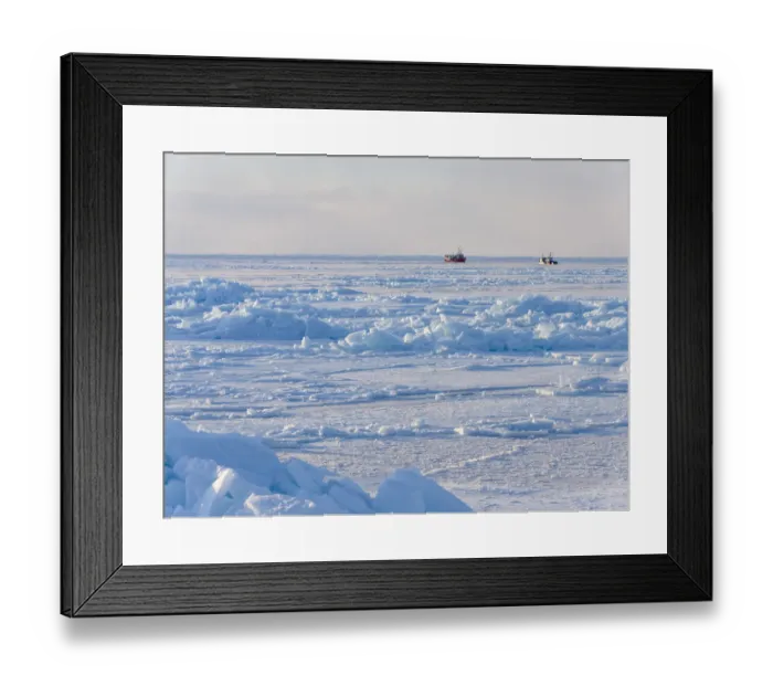 Framed Print : Ships in the sea ice of the frozen Disko Bay during winter, West Greenland, Denmark Framed Print : Ships in the sea ice of the frozen Disko Bay during winter, West Greenland, Denmark