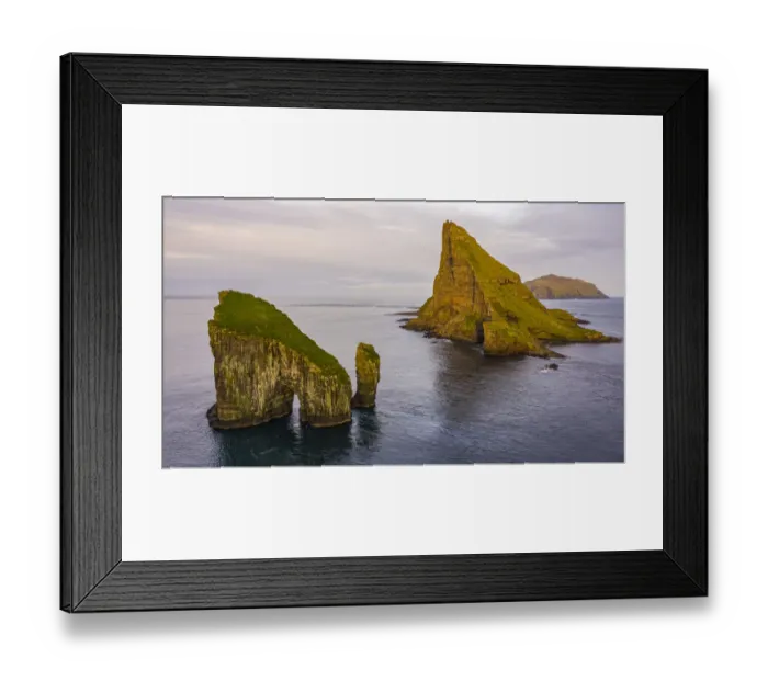 Framed Print : Europe, Faroe Islands. Aerial view of Drangarnir and Tindholmur off the coast of Framed Print : Europe, Faroe Islands. Aerial view of Drangarnir and Tindholmur off the coast of