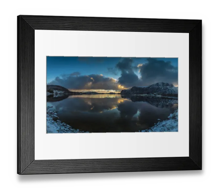 Framed Print : Europe, Norway. Snow covered mountains surround the still waters of Stullbruvaknet near Framed Print : Europe, Norway. Snow covered mountains surround the still waters of Stullbruvaknet near
