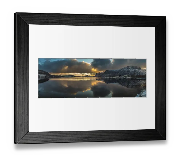 Framed Print : Europe, Norway. Snow covered mountains surround the still waters of Stullbruvaknet near