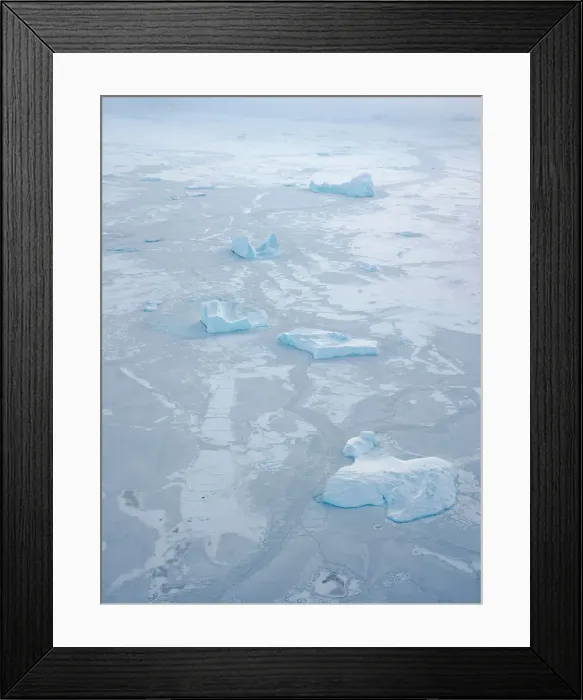Framed Print : Sea ice with icebergs in the Baffin Bay, between Kullorsuaq