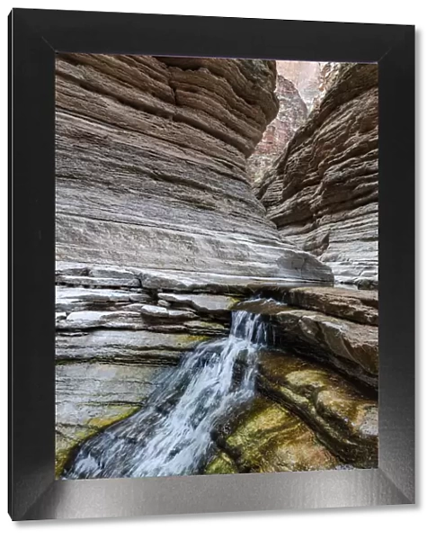 USA, Arizona. Small waterfall in Matkatamiba Canyon, Grand Canyon National Park