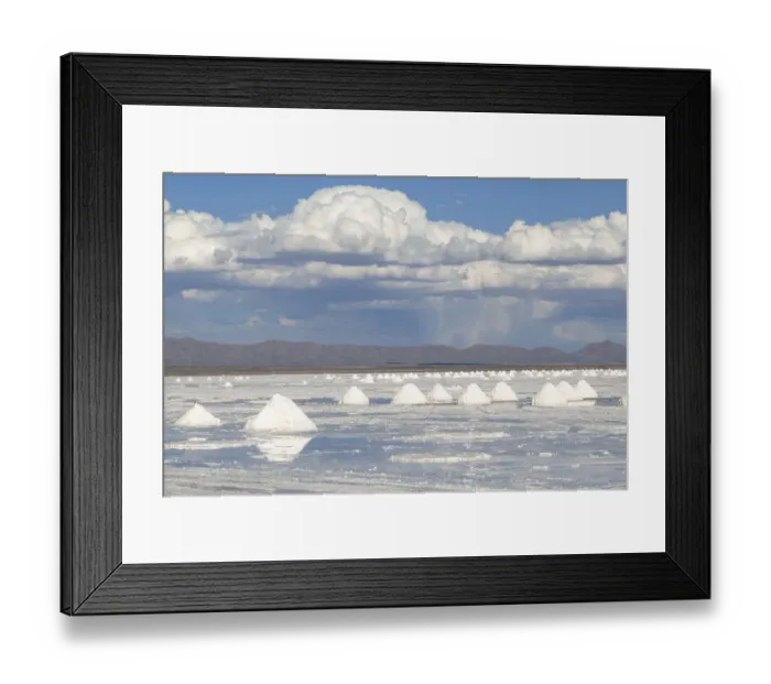 Framed Print : Bolivia, Uyuni, Salar de Uyuni. Cones of salt have been scraped up so that the salt will
