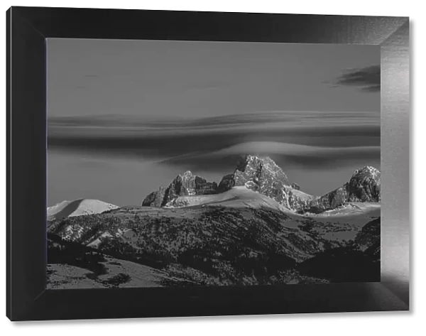 Black and white of Grand Teton, Middle Teton and Mount Owen with cirrus cloud seen