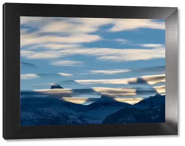 crepuscular Shadows cast by Teton Peaks before Sunrise. Altocumulus lenticularis clouds