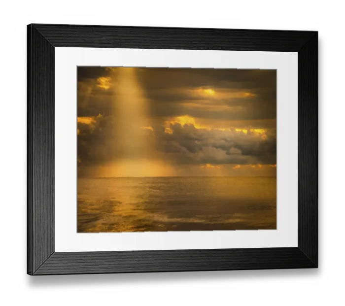 Framed Print : USA, New Jersey, Cape May National Seashore. Sunlight through storm clouds over ocean