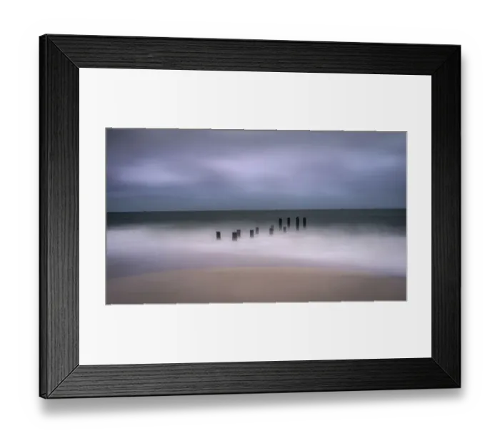Framed Print : USA, New Jersey, Cape May National Seashore. Jetty supports and wave spry on beach Framed Print : USA, New Jersey, Cape May National Seashore. Jetty supports and wave spry on beach