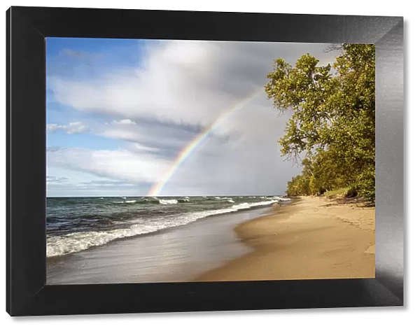 USA, Michigan, Munising, Rainbow over Pictured Rocks National Lakeshore