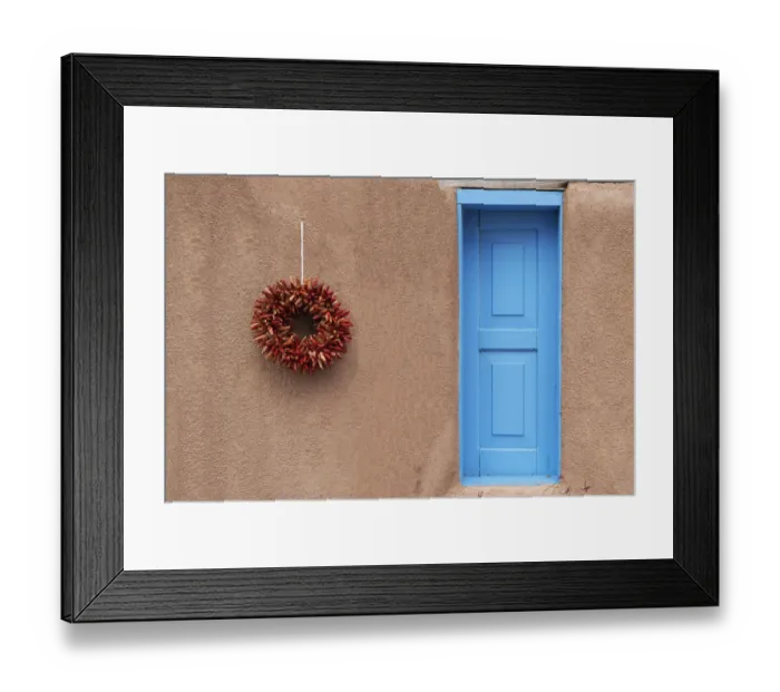 Framed Print : USA, New Mexico, Taos. Mission Ranchos de Taos, Adobe wall of residence with blue door
