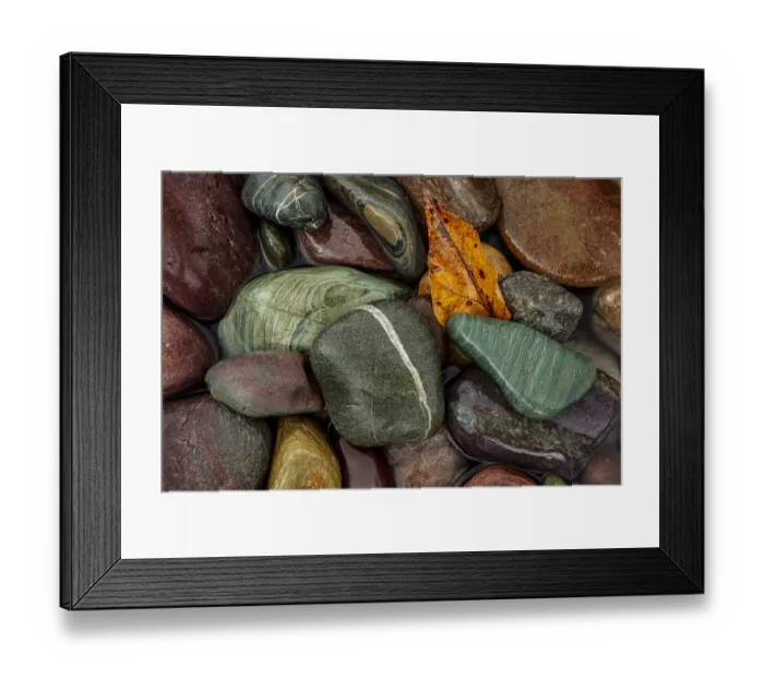 Framed Print : Colorful river rocks along the Middle Fork of the Flathead River in Glacier National Park