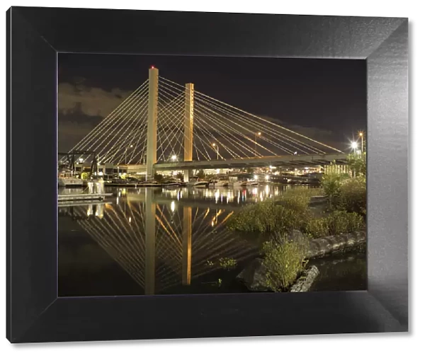 Usa, Washington State, Tacoma. Cable-stayed SR 509 bridge over Thea Foss Waterway at dusk