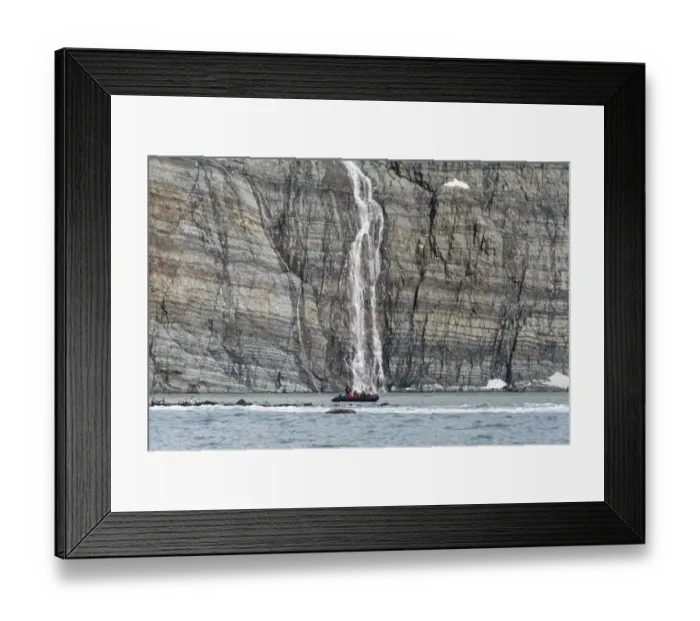 Framed Print : Zodiac approaching waterfall and king penguins on the beach, Gold Harbour, South Georgia Framed Print : Zodiac approaching waterfall and king penguins on the beach, Gold Harbour, South Georgia
