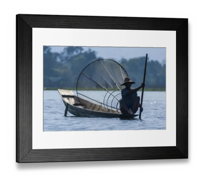 Framed Print : Inlay Lake, Shan State, Myanmar. Fisherman poles his canoe. (Editorial Use Only) Framed Print : Inlay Lake, Shan State, Myanmar. Fisherman poles his canoe. (Editorial Use Only)