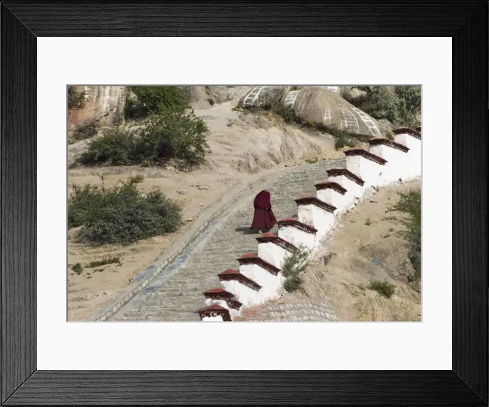 Framed Print : Monk walking the stairs in Drepung Monastery, one of the great three Gelug university Framed Print : Monk walking the stairs in Drepung Monastery, one of the great three Gelug university