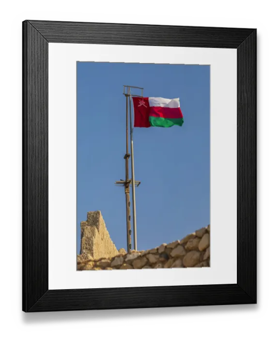 Framed Print : Middle East, Arabian Peninsula, Oman, Muscat, Muttrah. Omani flag flying in Muttrah Framed Print : Middle East, Arabian Peninsula, Oman, Muscat, Muttrah. Omani flag flying in Muttrah