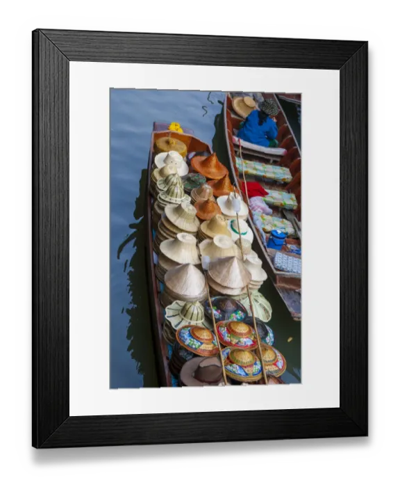 Framed Print : Damnoen Saduak Floating Market, Bangkok, Thailand. Boatload of hats for sale Framed Print : Damnoen Saduak Floating Market, Bangkok, Thailand. Boatload of hats for sale