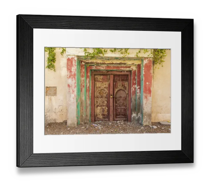 Framed Print : Middle East, Arabian Peninsula, Al Batinah South. Old carved wooden door on a building in